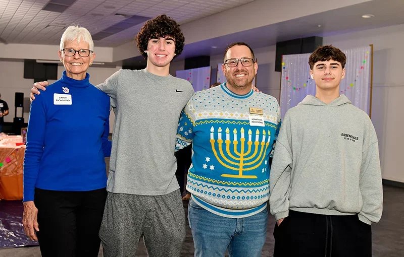family at hanukkah party