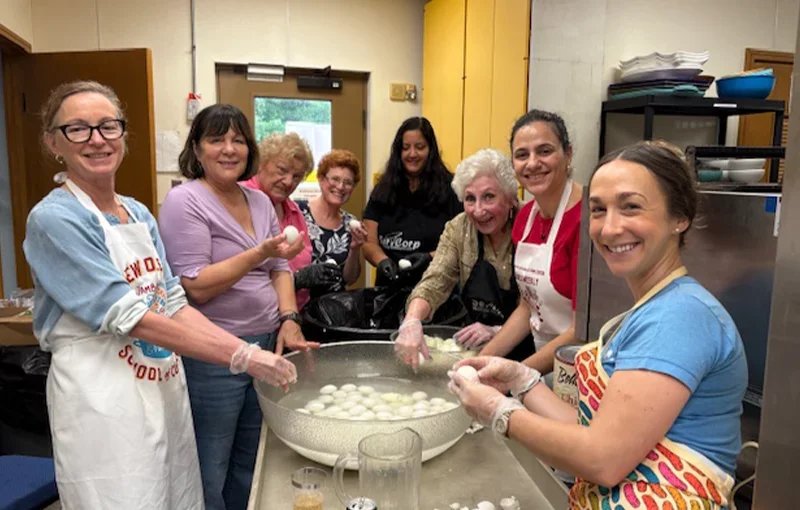women baking in a synagogue kitchen